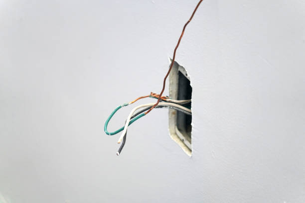 unfinished electrical wire install on the wall
