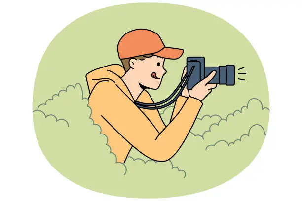 Vector illustration of Young man reporter hide in bushes make pictures