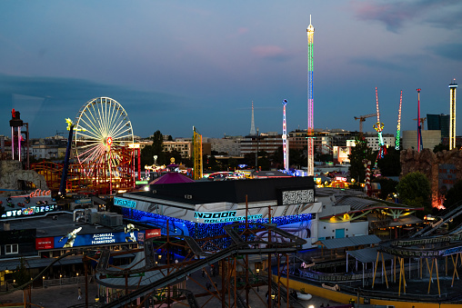 Vienna, Austria. 01 October 2023 skyline of the ctiy at twilight form Wienner Riesenrad ferris wheel in Prater amusement park