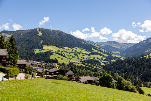 Village Alpbach in Austria at summer day. Traditional architecture, amazing environment in valley on European apls. Tyrol region, Austria, Europe.