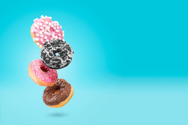 Delicious donut on color background stock photo