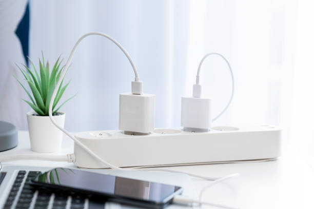 istock Charger connected to a power white strip 1945880953