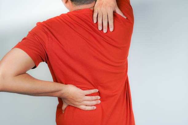 istock A man has chronic lower back pain and suffers from lower back pain 1945925414