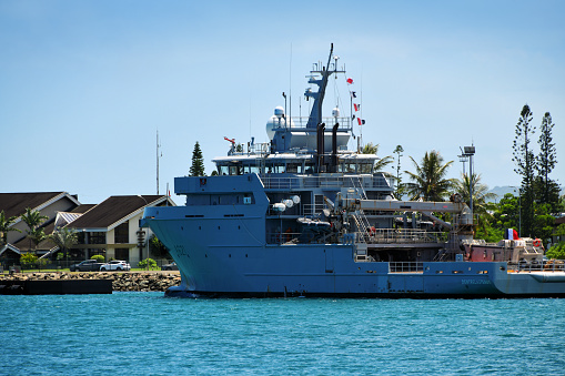 Nouméa, South Province, New Caledonia: D'Entrecasteaux oceanic patrol ship - first of its class, named after the French navigator Antoine Bruny d'Entrecasteaux, an overseas support and assistance vessel (BSAOM), aka multi-mission vessel (B2M), designed to perform sovereignty, law enforcement and logistics missions - developed and produced by Kership, built at the Piriou shipyard in Concarneau. The d'Entrecasteaux class vessels can be armed with two 12.7x99 mm (.50 cal.) machine guns.