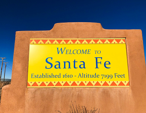 Welcome to SANTA FE Sign in Adobe Wall