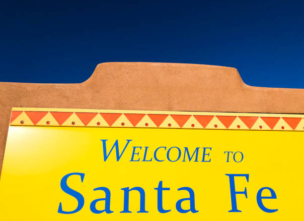 istock Welcome to SANTA FE Sign in Adobe Wall 1945955558
