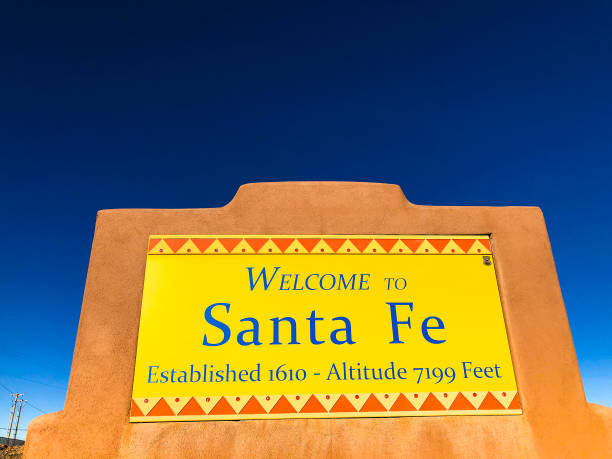 istock Welcome to SANTA FE Sign in Adobe Wall 1945955565