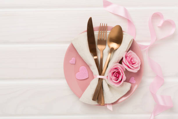 istock Festive table setting for Valentine's Day on wooden background, top view 1946004907