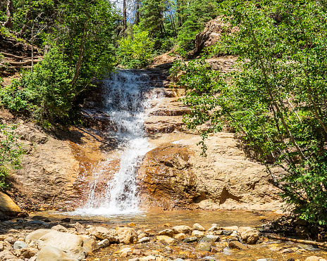In late spring and early summer, you can find beautiful waterfalls flowing from snowmelt flowing through rock formations and down cliffs. The fast-moving water and volume can cause roaring and thunder sounds.