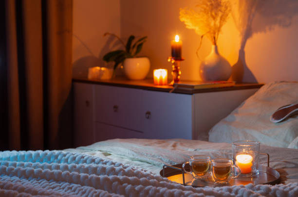 istock cup of tea in bedroom at night 1946114126