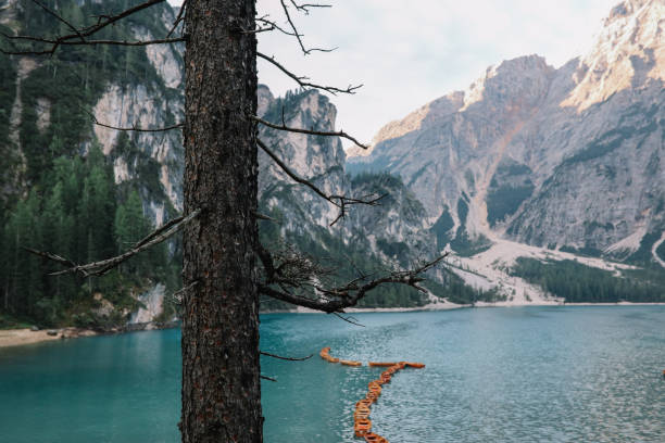 Scenic mountain range above the Lago di Braies in Dolomites, Italy