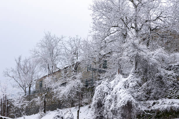 istock Dardhe village in snow 1946172688