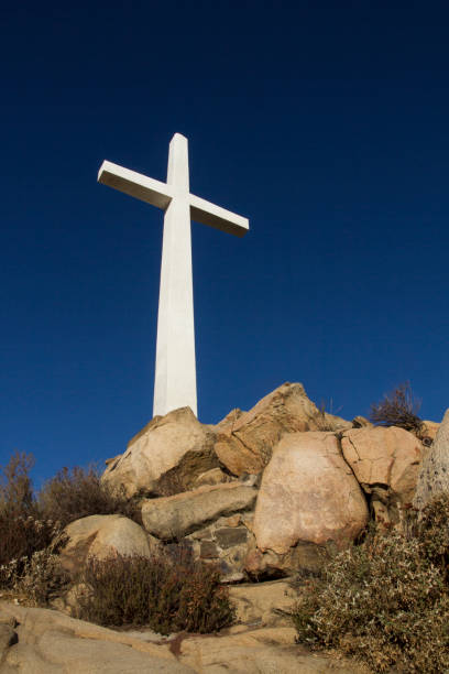 istock White cross on stone Calvary hill 1946201712