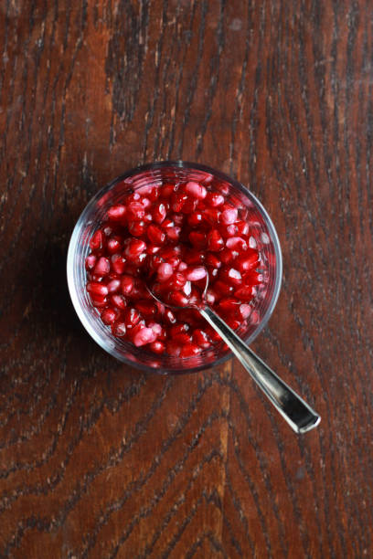 istock Pomegranate seeds in a glass bowl 1946242180