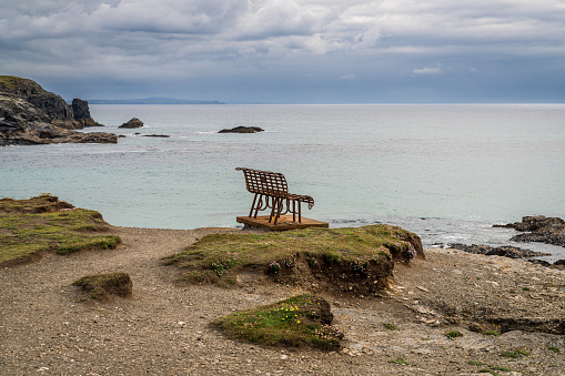 An old rusty bench in Treyarnon Bay, Cornwall, England, UK
