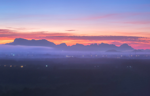 Beautiful Sea of fog  with the mountains during sunrise time at Wat Khao Lan  Amphoe Wang Sombun, Sa Kaeo 
 province Thailand.