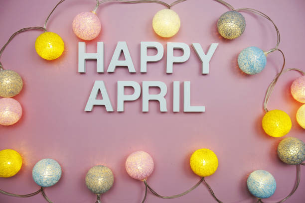 istock Happy April alphabet letters on pink background 1946380331