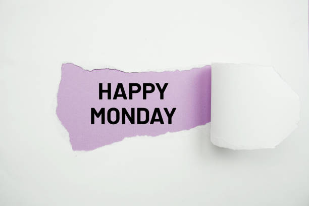 istock Happy Monday text message on purple background 1946381880