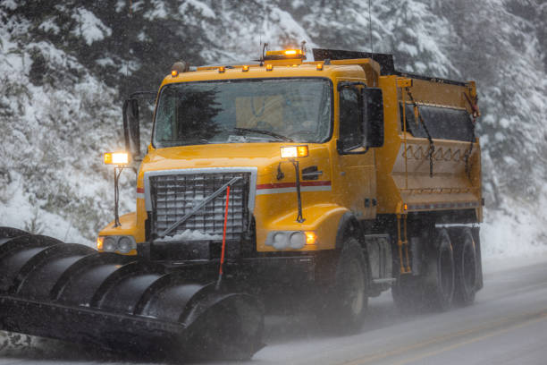 istock Snow plow removing ice and snow 1946384537