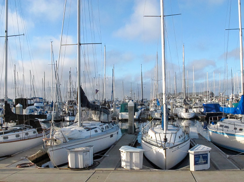 Monterey, California, United States - 19 June 2014: Sailboats docked at Monterey Bay Marina in California.