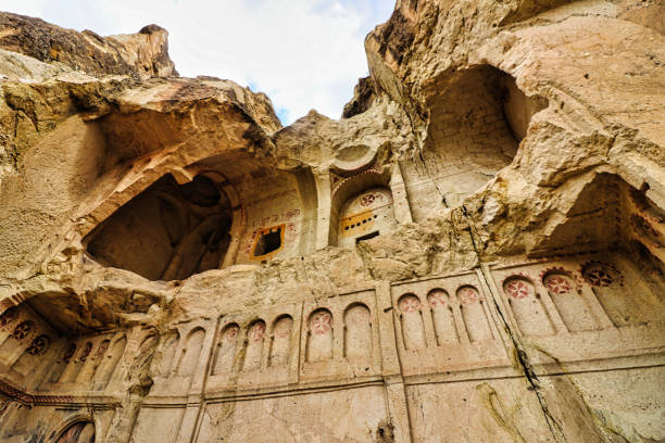 Dark Church, Goreme Open Air Museum, Cappadocia, Turkey Exterior view of Famous Karanl?k Kilise or Dark Church inside the Göreme open air museum, a UNESCO world heritage site in Cappadocia,Turkey. uchisar stock pictures, royalty-free photos & images