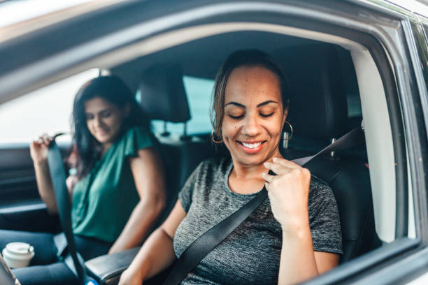 istock Women putting on seat belts 1946483999