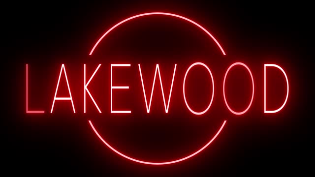 Glowing and blinking red retro neon sign for LAKEWOOD