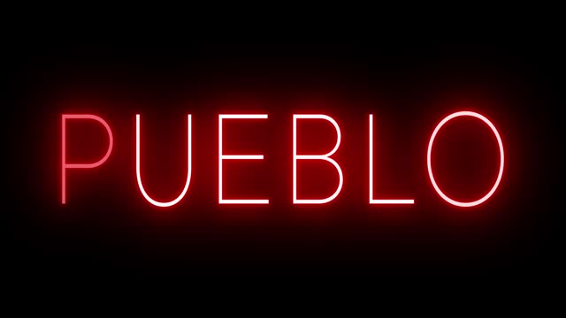 Glowing and blinking red retro neon sign for PUEBLO