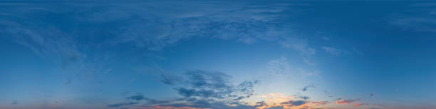 istock Sunset sky panorama with bright glowing pink Cirrus clouds. Seamless hdr 360 panorama in spherical equirectangular format. Full zenith for 3D visualization, sky replacement for aerial drone panoramas 1946578204