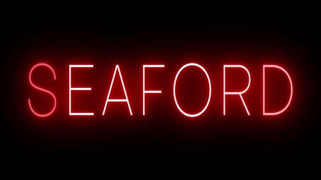 Glowing and blinking red retro neon sign for SEAFORD
