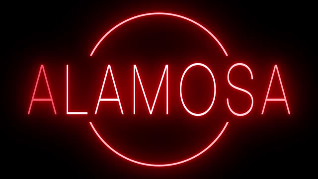 Glowing and blinking red retro neon sign for ALAMOSA