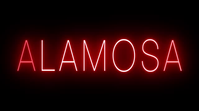 Glowing and blinking red retro neon sign for ALAMOSA
