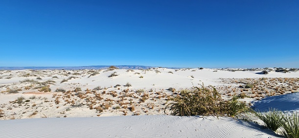 A scenic landscape view of White Sands National Park in New Mexico.