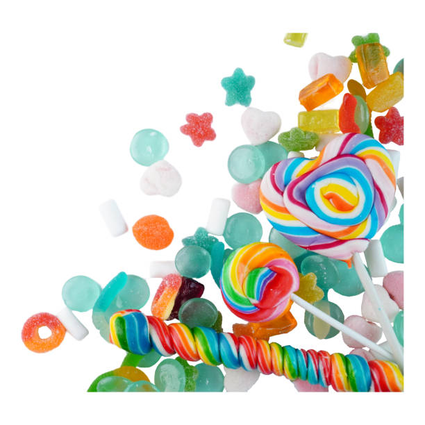 istock Colorful assorted candy border isolated on white background 1946690044