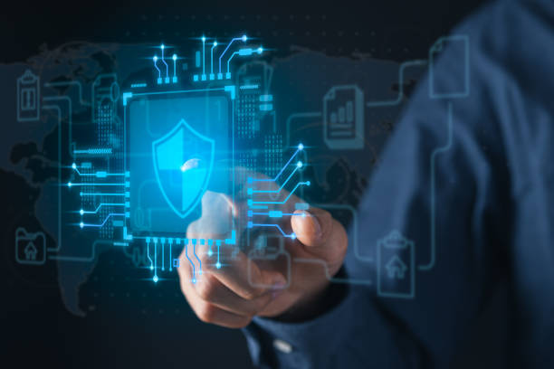 istock Businessman holding cyber security icons screen. Digital information technology and cyber security concept. 1946792819