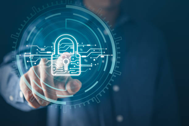 istock Businessman holding cyber security icons screen. Digital information technology and cyber security concept. 1946792823