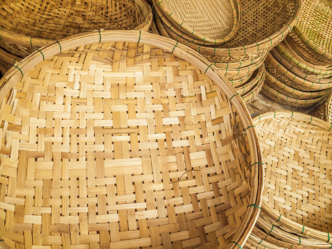 Detail of woven cane baskets for sale at market, Vietnam