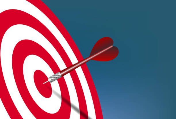 istock Red darts arrows in the target center. Success hitting target goal achievement concept. Business success 1946933545