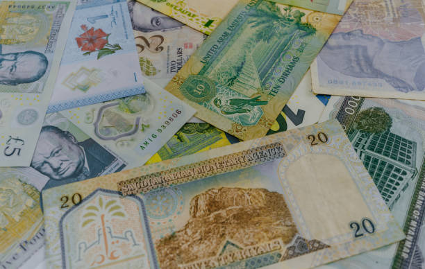 istock Pile of currencies from different countries. 1946956719