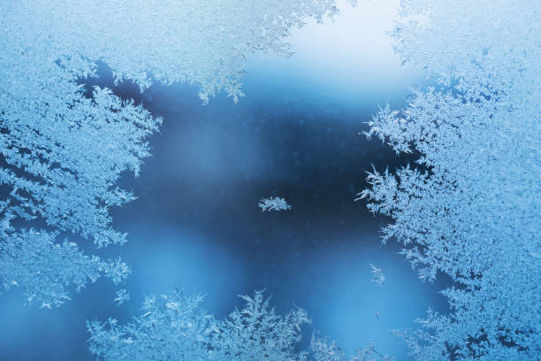 istock Background with frosty patterns on glass, template for designer 1946972498