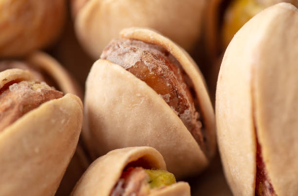 istock Fresh pistachios as a background. Macro 1946989396