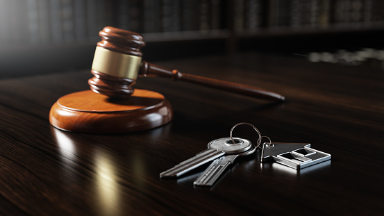 Judicial Gavel and Real Estate Keys: Law Legal Divorce and Auction concept.