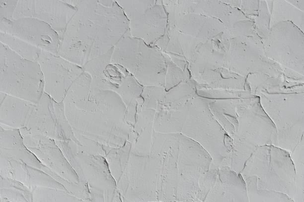 istock white painting cement wall texture background 1947040518