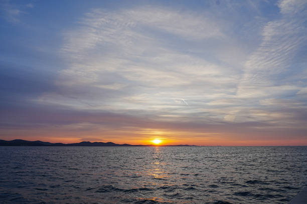 Sunsut (red glare) with sea of Zadar