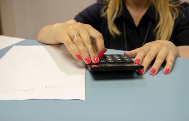 istock Shot Of A Young Businesswoman Using A Digital Tablet While At Work 1947194813