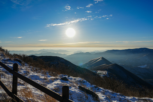 Sunrise on the mountain range in winter