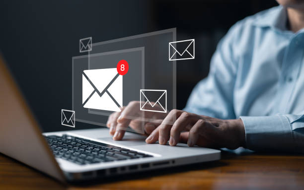 istock Email marketing concept, person reading e-mail on laptop computer, receive new message. New email notification concept for business e-mail communication and digital marketing. newsletter online. 1947228580