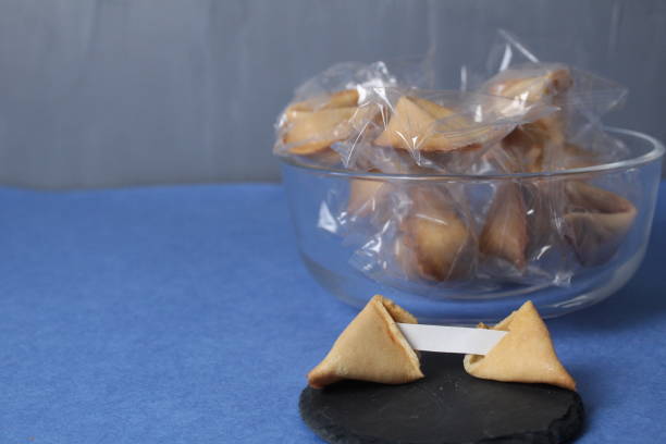 istock Chinese biscuits on a stand on a background with prediction text. Chinese New Year Traditions 1947231222