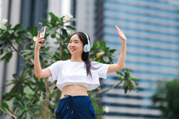istock Tunes of Tranquility: Outdoor Escapade with Headphone Harmony 1947297437