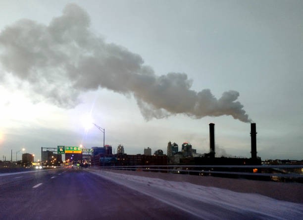 Smokestack from the road on a cold day